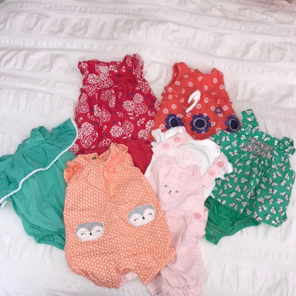 Bundle of newborn baby girl outfits